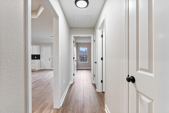 hall featuring light hardwood / wood-style floors