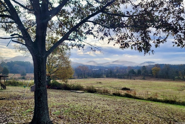 view of mountain feature with a rural view