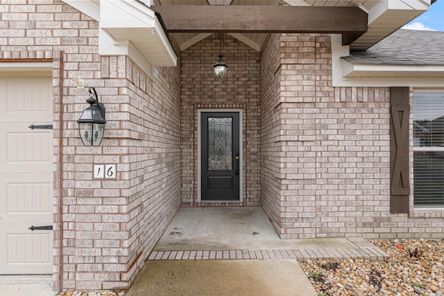 property entrance with a garage