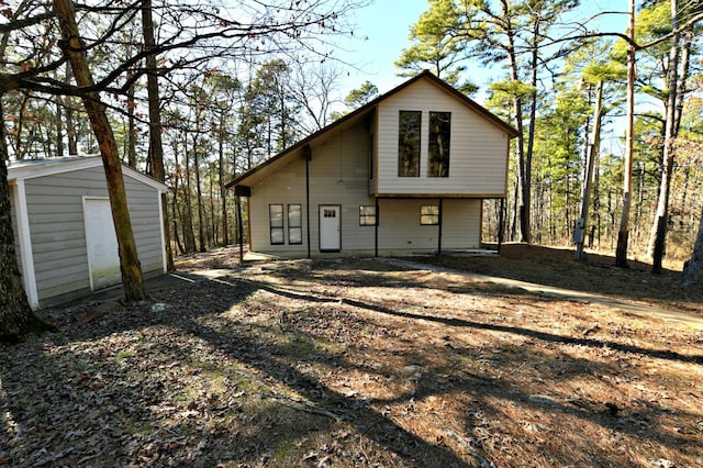 exterior space featuring a shed