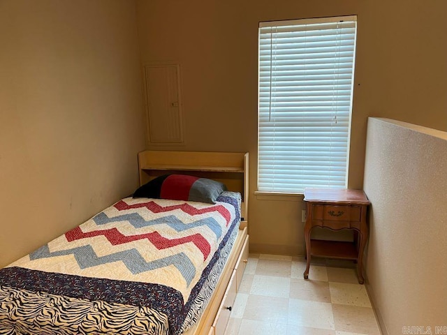 bedroom featuring multiple windows