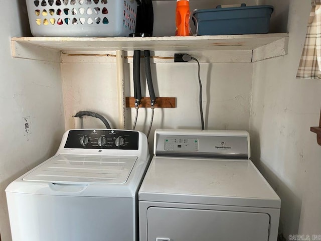 laundry room with separate washer and dryer