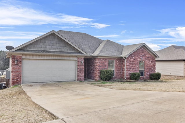 ranch-style house featuring a garage