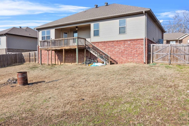 back of house with a yard