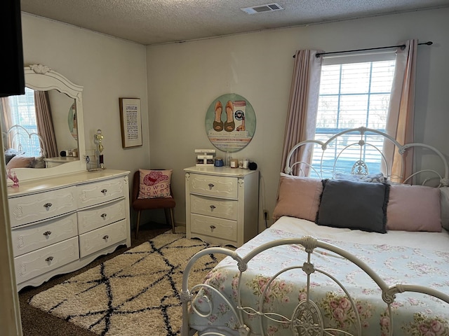 bedroom with a textured ceiling