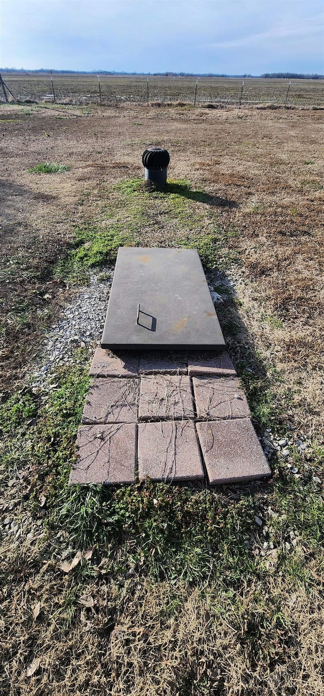 view of entry to storm shelter