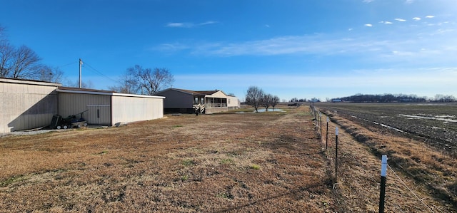 view of yard featuring a rural view