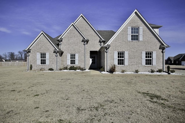 view of front of house with a front lawn