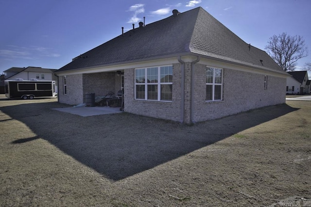 rear view of property with a patio