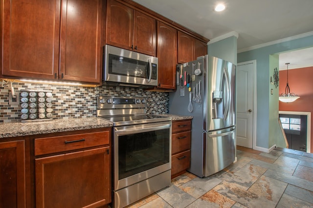 kitchen featuring crown molding, pendant lighting, appliances with stainless steel finishes, backsplash, and light stone countertops