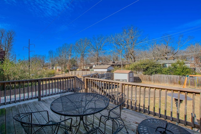 deck with a storage shed