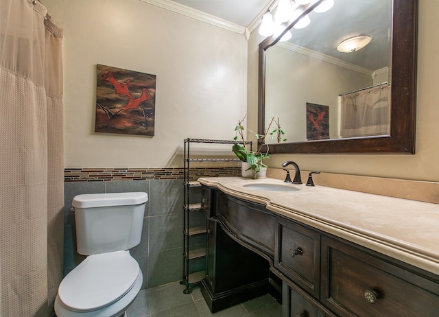 bathroom featuring tile patterned floors, tile walls, toilet, vanity, and ornamental molding