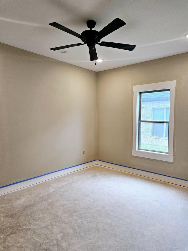 empty room featuring ceiling fan