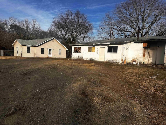 ranch-style home with a front yard