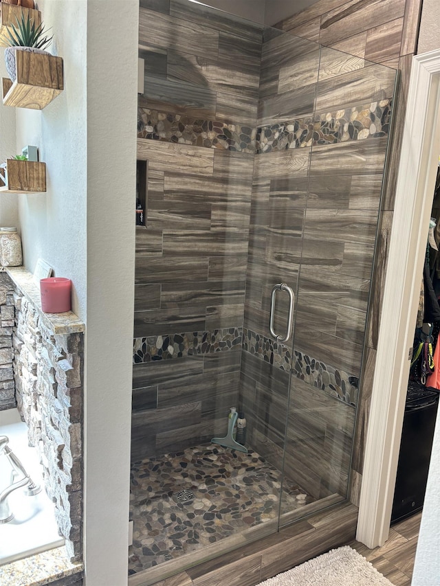 bathroom with an enclosed shower
