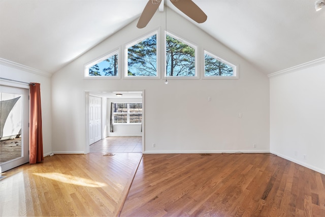 unfurnished living room featuring ceiling fan, lofted ceiling, and light hardwood / wood-style floors