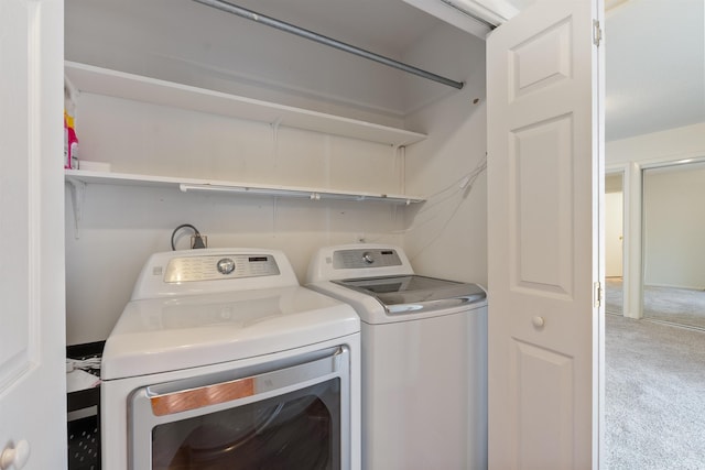 washroom with carpet and washing machine and dryer