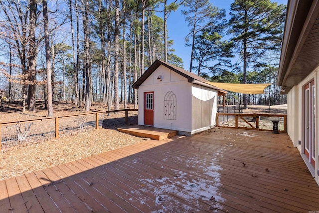 wooden terrace with a shed