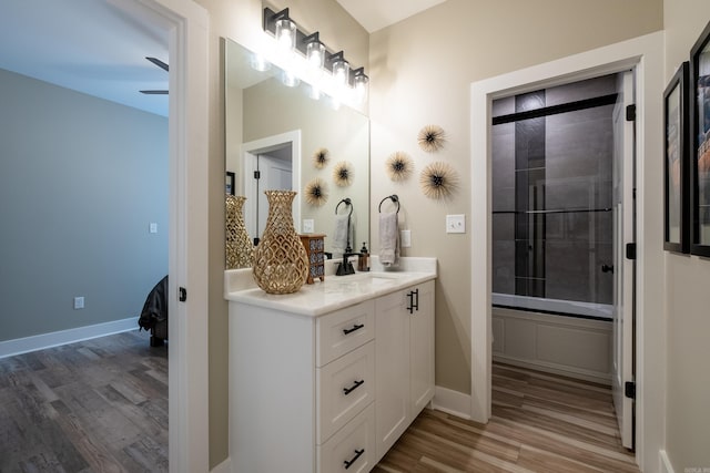 bathroom with vanity and hardwood / wood-style floors