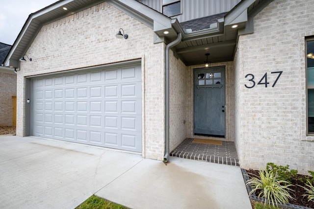 property entrance with a garage