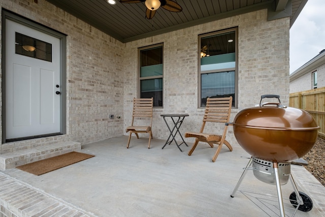 view of patio / terrace featuring ceiling fan and grilling area