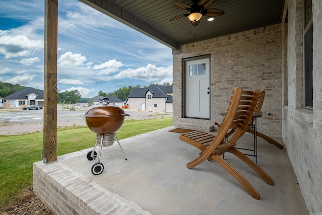 view of patio featuring grilling area and ceiling fan