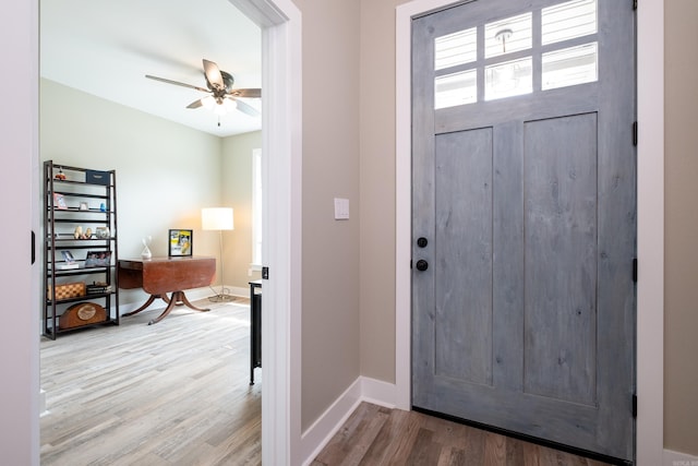 foyer featuring hardwood / wood-style flooring and ceiling fan