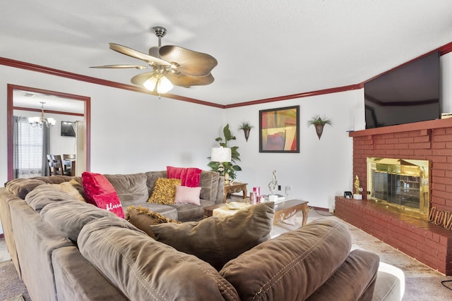 carpeted living room featuring ceiling fan with notable chandelier, crown molding, and a fireplace