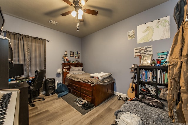 bedroom featuring ceiling fan and light wood-type flooring