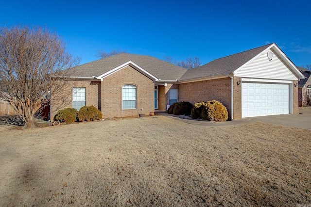 single story home featuring a garage