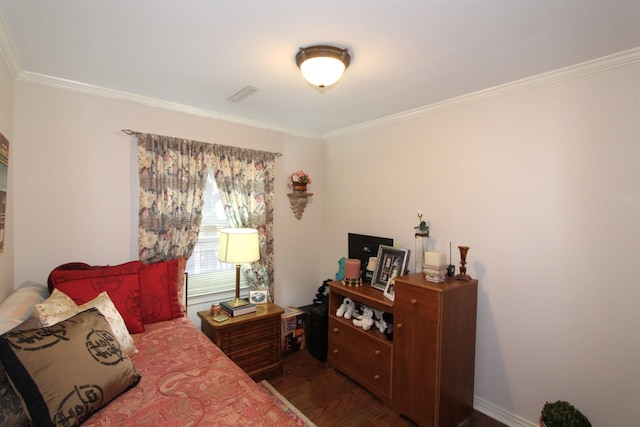 bedroom with dark wood-type flooring and ornamental molding