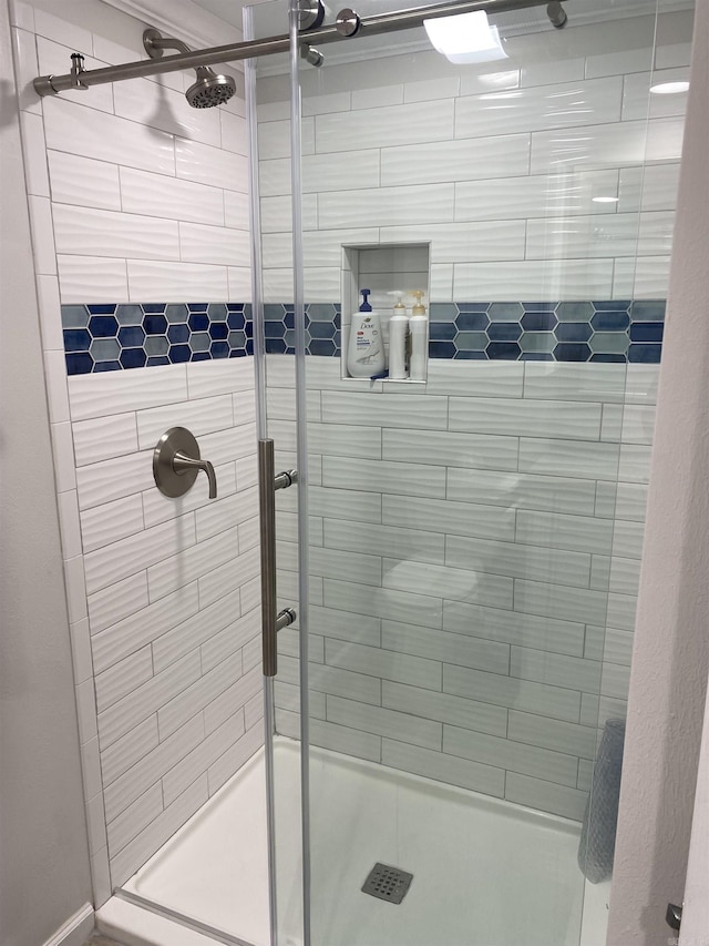 bathroom with an enclosed shower