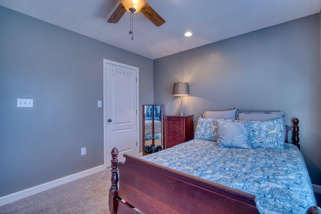 bedroom with ceiling fan and carpet