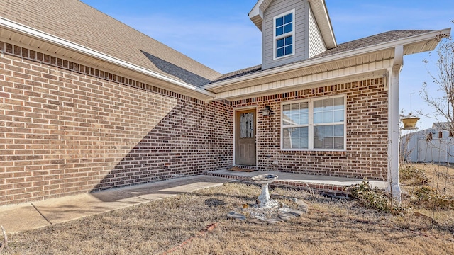 property entrance with a patio area