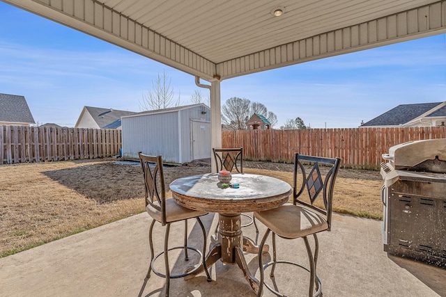 view of patio / terrace with a storage unit