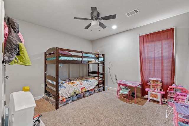 carpeted bedroom with ceiling fan