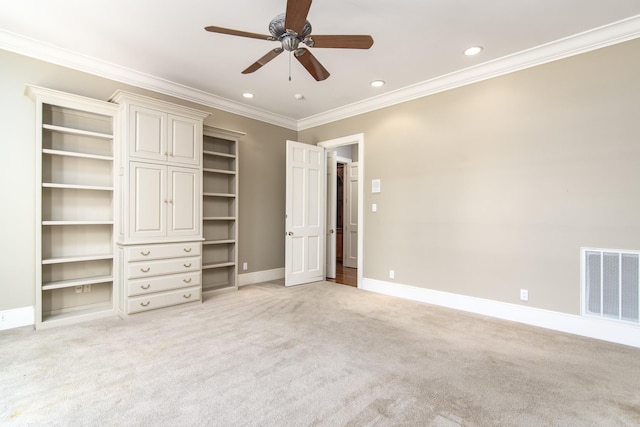 unfurnished bedroom with ceiling fan, ornamental molding, and light carpet