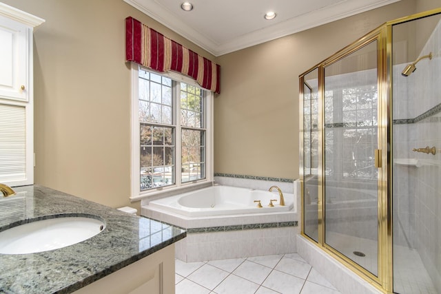 bathroom featuring vanity, ornamental molding, independent shower and bath, and tile patterned flooring