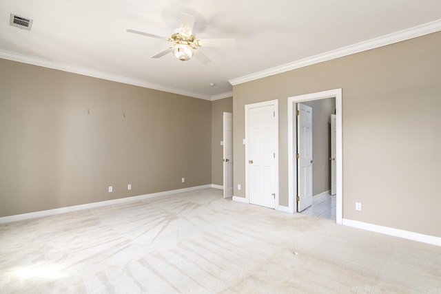 unfurnished bedroom with light carpet, ceiling fan, and crown molding