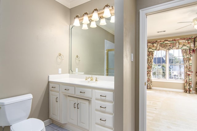 bathroom featuring ceiling fan, toilet, vanity, and crown molding