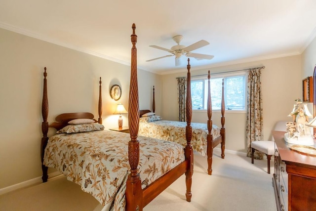 bedroom with ceiling fan, crown molding, and light colored carpet