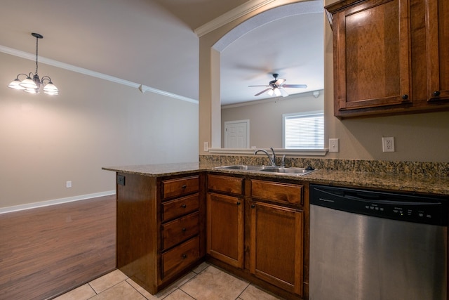 kitchen featuring dishwasher, kitchen peninsula, sink, light tile patterned floors, and ceiling fan with notable chandelier