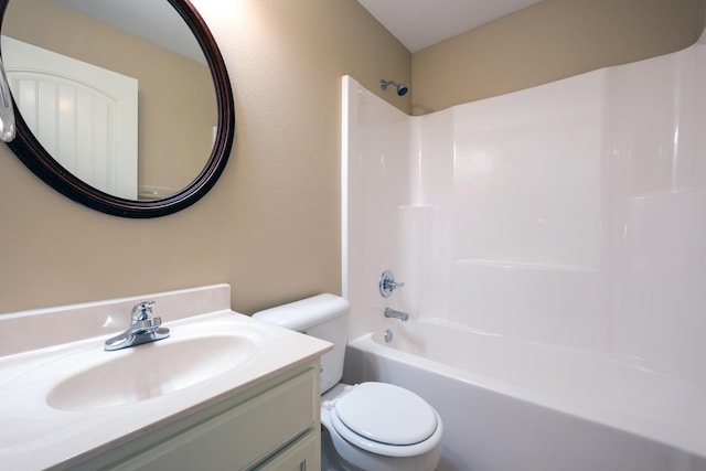 full bathroom featuring toilet, vanity, and shower / washtub combination