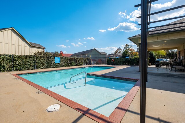 view of pool with a patio area