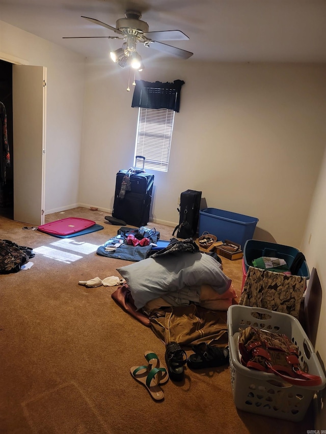 bedroom with ceiling fan and carpet