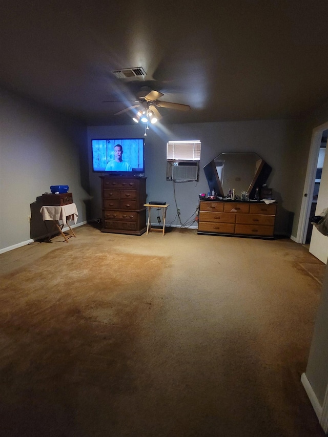 bedroom featuring a wall unit AC and carpet flooring