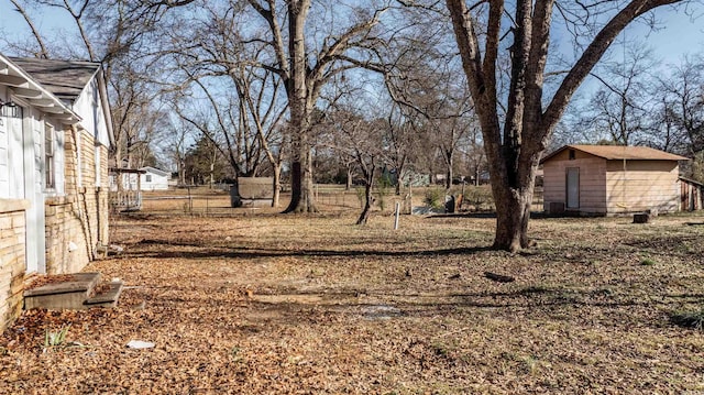 view of yard with a shed