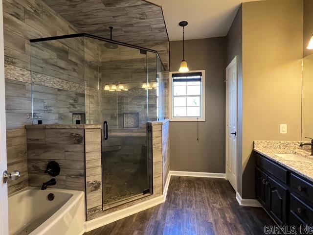 bathroom with vanity and wood-type flooring