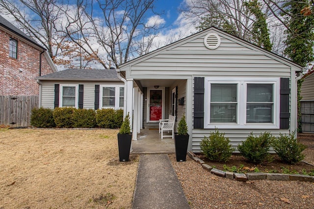 bungalow with a front yard