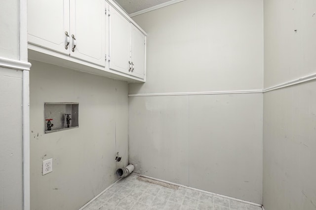 laundry room featuring cabinets and hookup for a washing machine